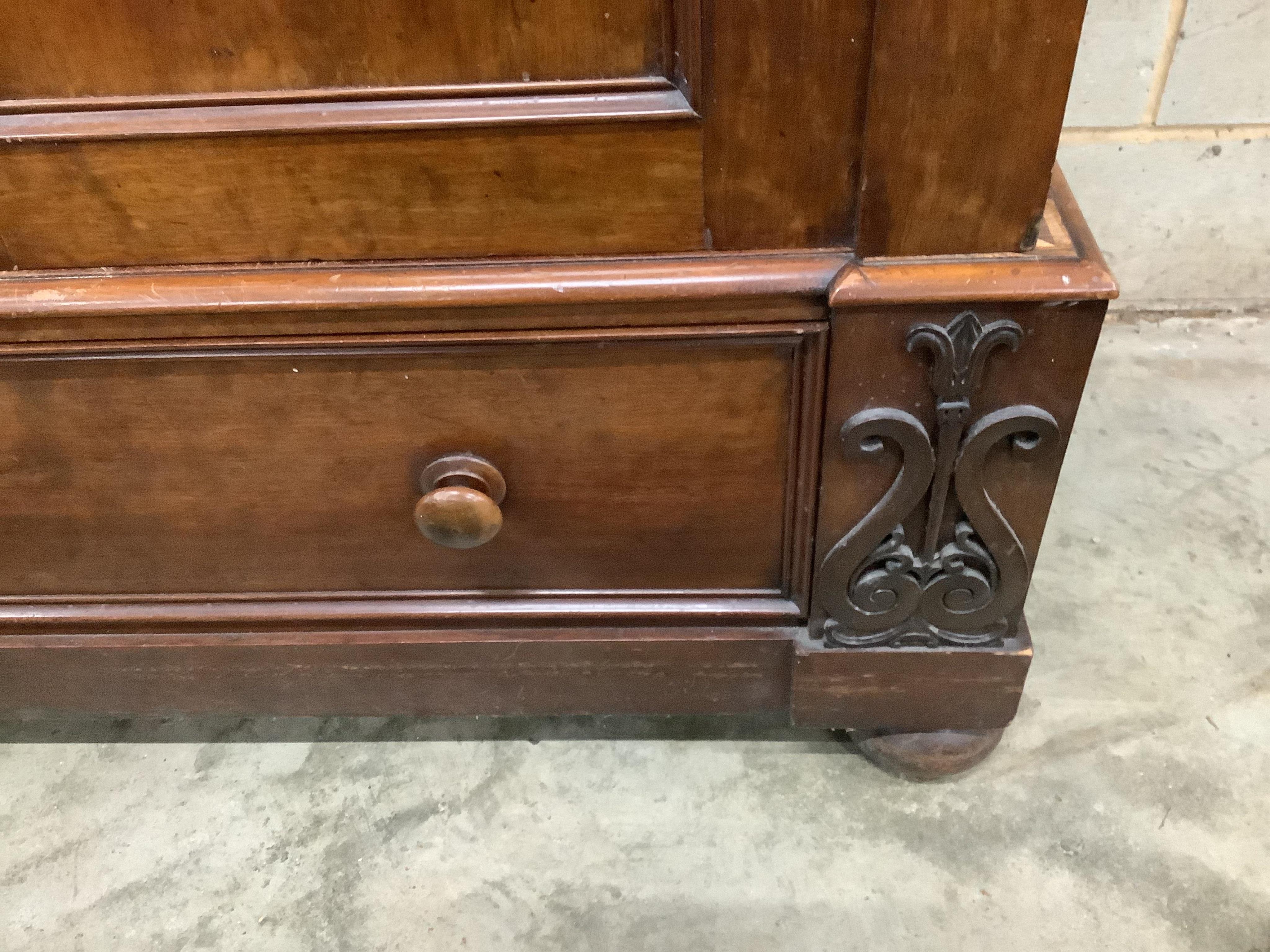 An early Victorian mahogany compactum wardrobe, width 140cm, depth 72cm, height 200cm. Condition - fair